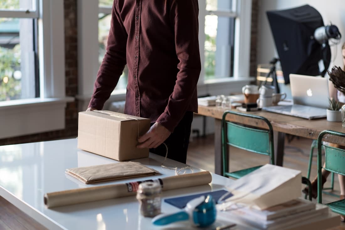 A team member packing a box